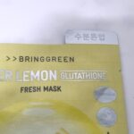 Mặt nạ BRINGGREEN Super Lemon Glutathione Fresh Mask với thiết kế tông vàng nổi bật, thành phần dưỡng trắng và cấp ẩm cho da.